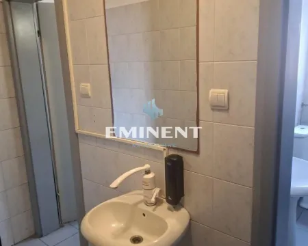 View of the washbasin with a mirror in the bathroom. - image 13