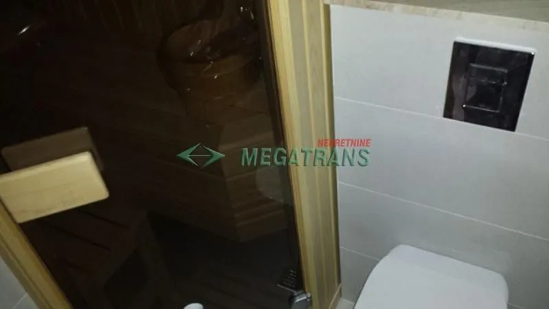 View of the bathroom with a sauna.