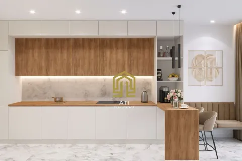 Moderna kuhinja sa drvenim elementima i ugradnim uređajima. - image 6