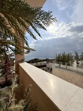 View from the terrace towards the yard and the sea in the distance. - image 19
