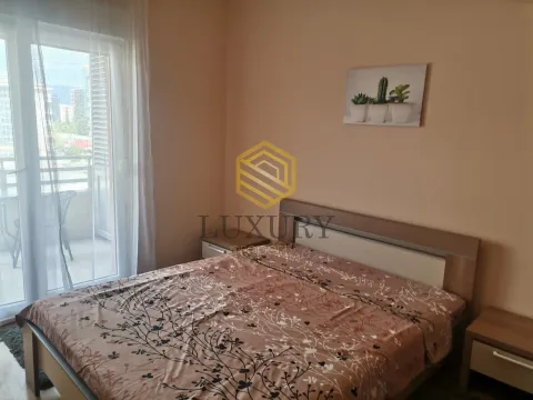 Furnished bedroom with a double bed and access to the terrace. - image 5