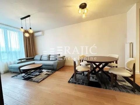 Spacious living room with dining area and modern furniture. - image 11
