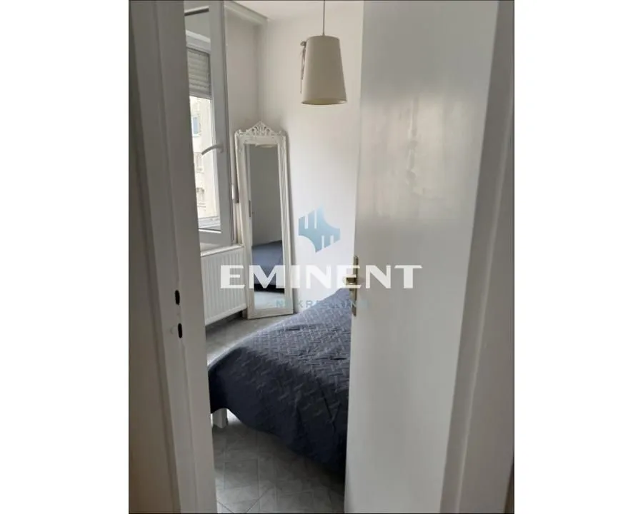 View of the bedroom through an open door.