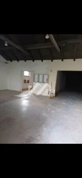 Unfinished interior space with a wooden roof structure. - image 2