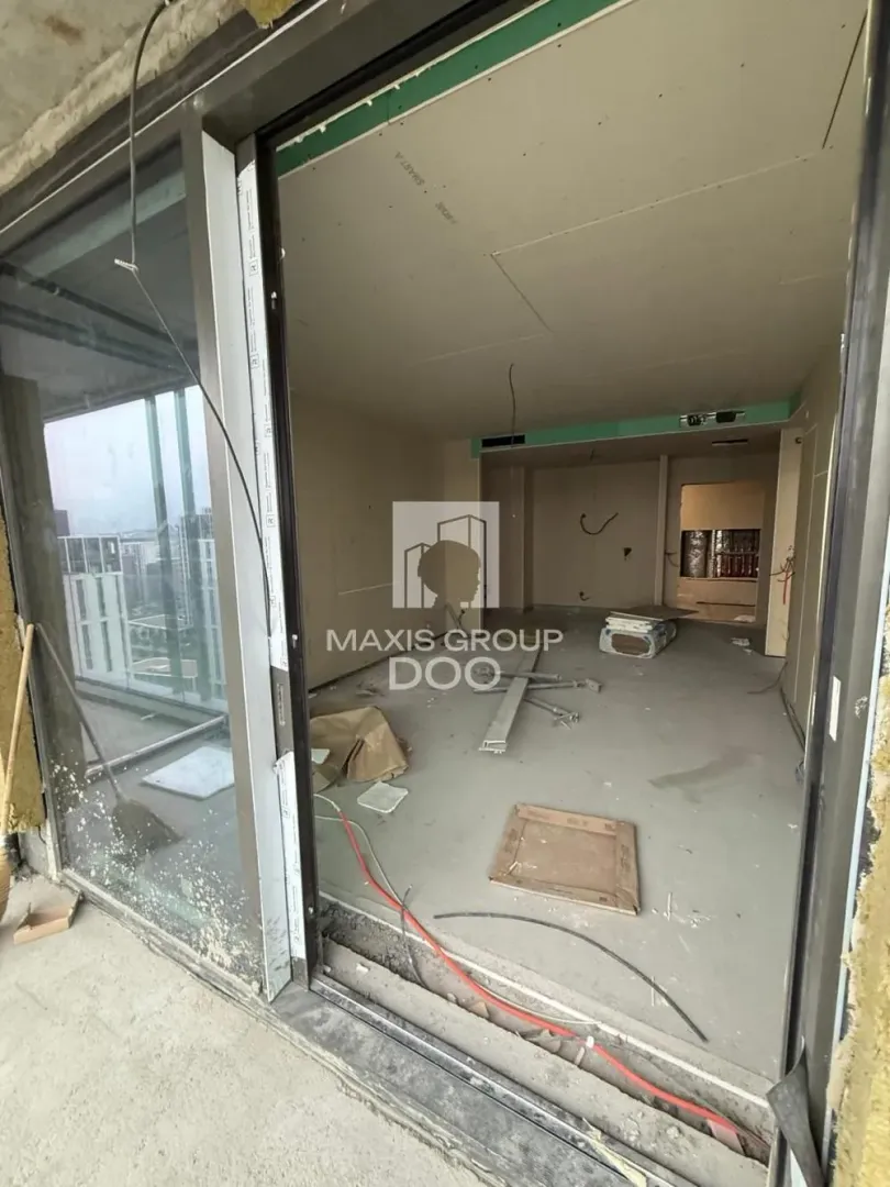 View from the interior of a property under construction towards the terrace and outdoor space.