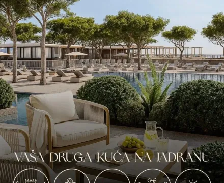Courtyard with seating furniture and a view of the pool and greenery. - image 12