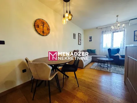 Living room with dining area and sofa set. - image 2