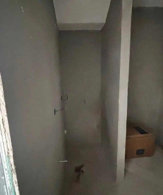 Interior of a room under rough construction.