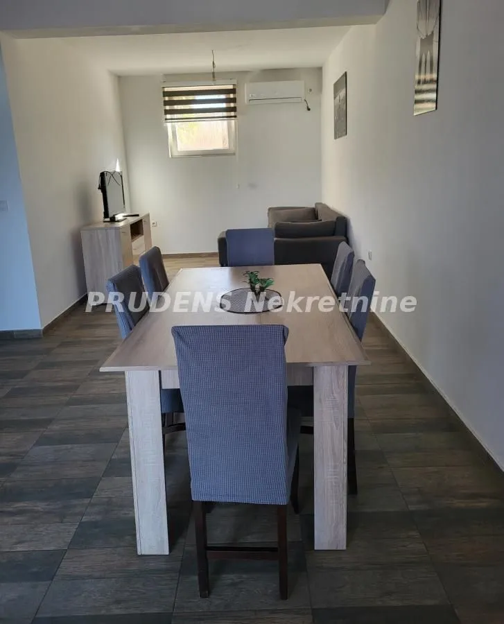 Living room with a dining table and chairs.