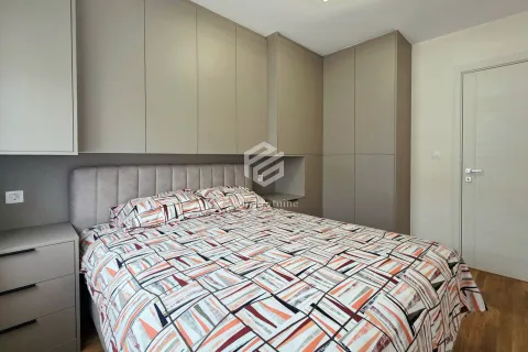 Furnished bedroom with a double bed and fitted wardrobes. - image 6