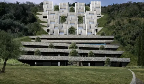 Spoljašnji pogled na moderno zdanje sa kaskadnim terasama i uređenim dvorištem. - image 4