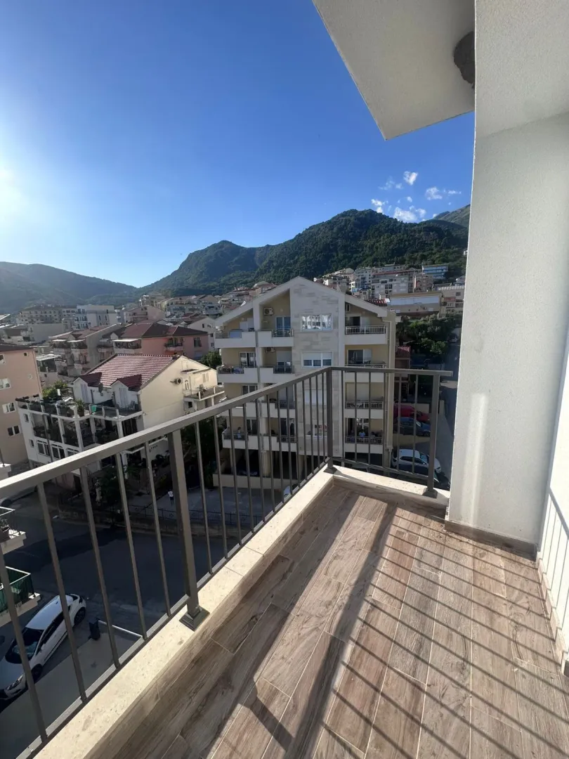 View from the balcony of the neighborhood and surrounding mountains.