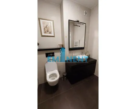 Modernly equipped bathroom with sanitaryware in dark tones. - image 9