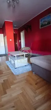 Living room with red walls, sofa set and coffee table. - image 15