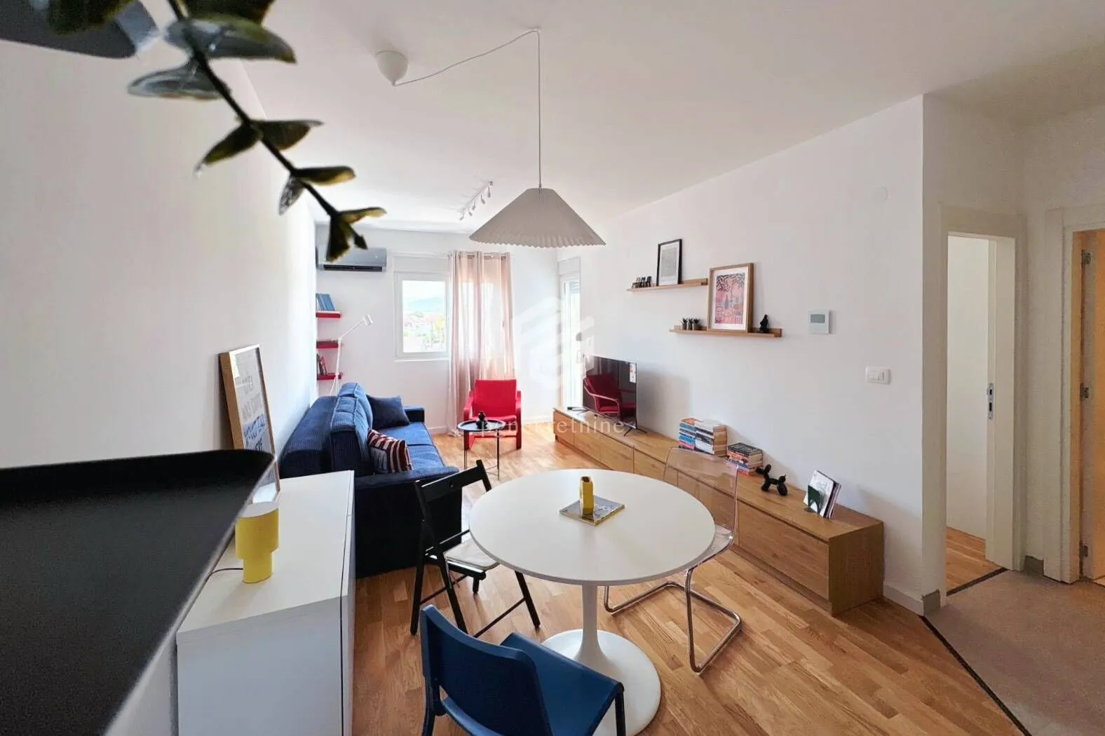 Living room with dining table and furniture.