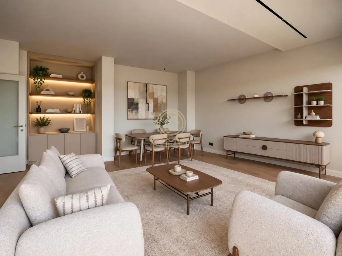 Spacious living room with a sofa set, dining table and built-in illuminated shelving.