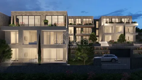 Night view of a modern residential building with terraces and landscaped yard. - image 7