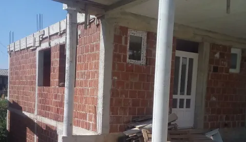 House under construction with unfinished facade. - image 3
