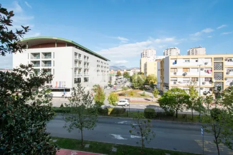 View from the window overlooking the street and surrounding buildings. - image 2