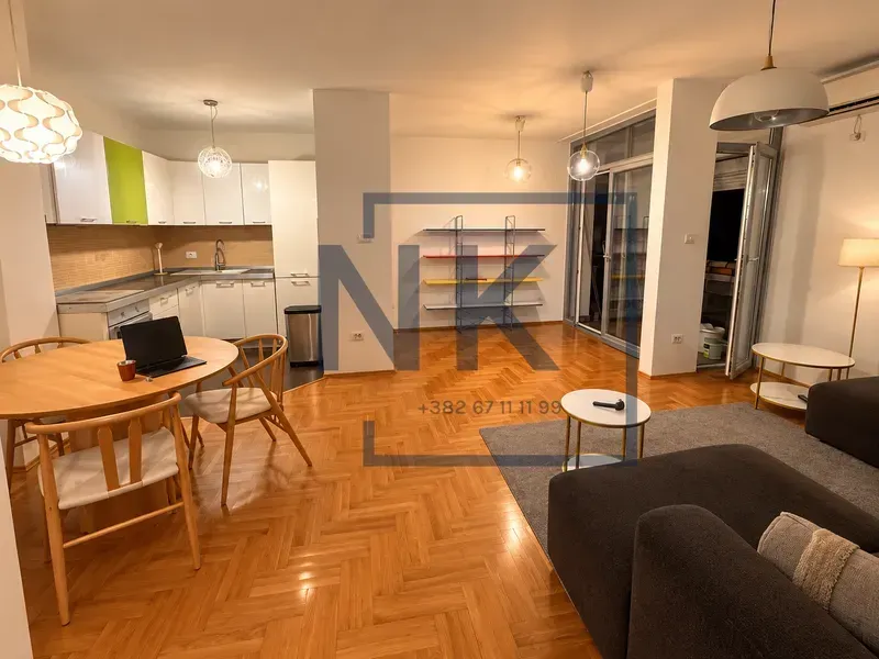 Spacious living room with a dining area and an open kitchen.