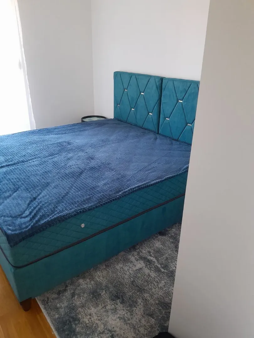 Bedroom with a large double bed.