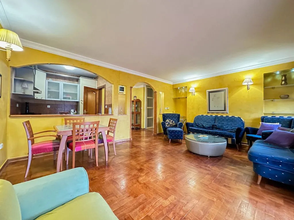 Spacious living room with a dining area and an open pass-through to the kitchen.