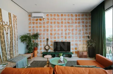 Modern living room with a sofa and a decorative wall. - image 14