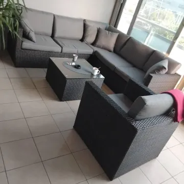 Furnished covered terrace with seating set. - image 6