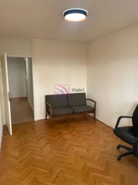 Small room with a loveseat sofa and an office chair, featuring parquet flooring. - image 7